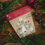 sow n sow australian christmas gift of seeds australian native everlasting daisies front of card surrounded by real flowers and greenery