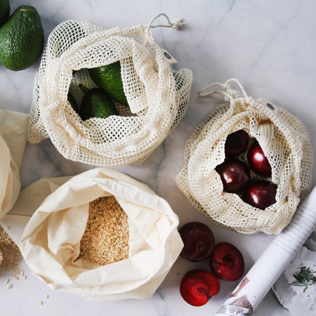 Ever Eco reusable organic cotton produce bag mixed set of 4 out of packaging filled with fruit and grains