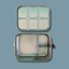 Stainless steel bento lunch box with 3 leak-proof compartments with the leak resistant lid off on a blue background