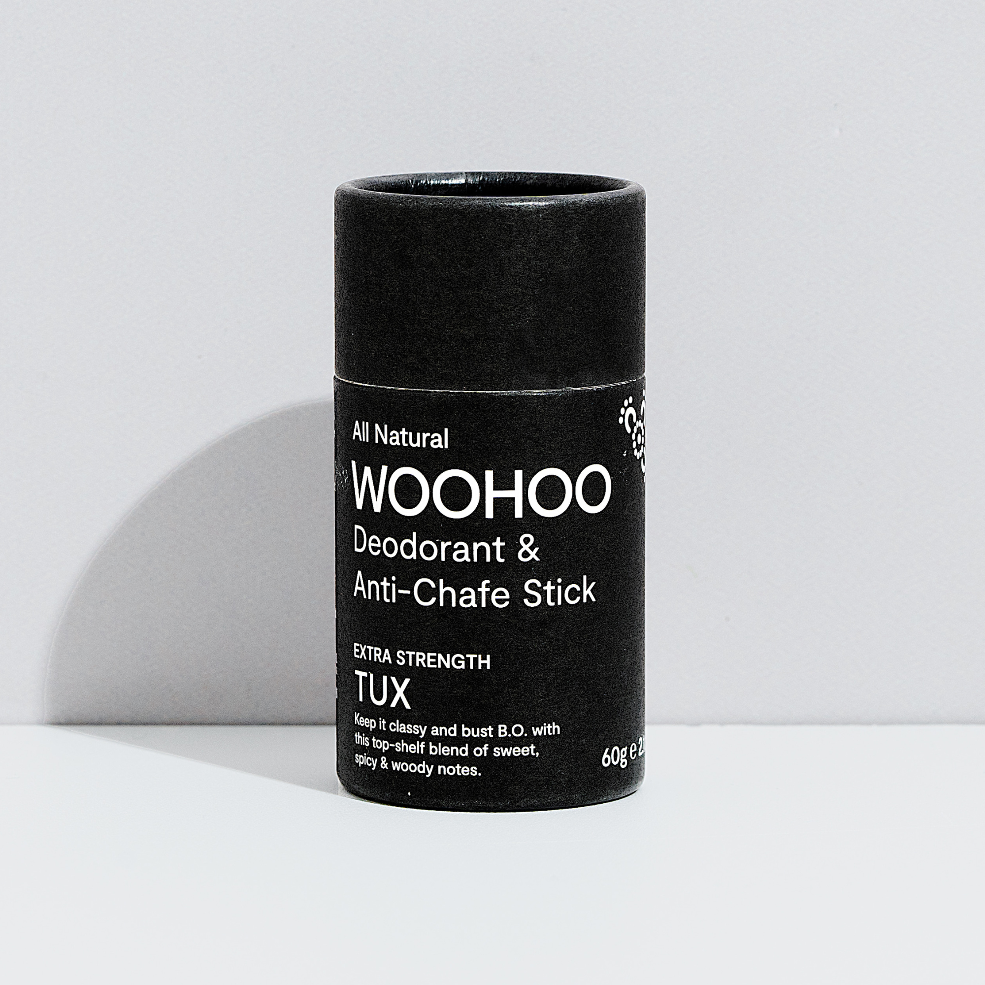 woohoo body deodorant and anti-chafe stick tux extra strength 60 grams front of tube packaging tube with grey background